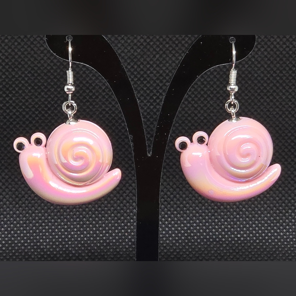 Pearlescent pink snail earrings